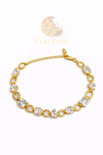 Cargar imagen en el visor de la galería, Pulsera de Lujo Cuki Zvian con Cristales Brillantes y Baño en Oro de 14K
